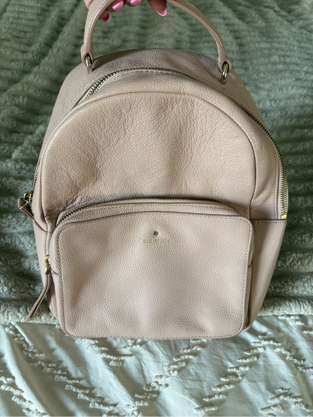 Kate Spade Light Pink Pebbled Leather Mini Backpack
